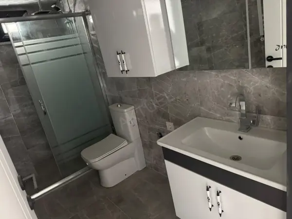 HÜRRİYET MAHALLESİNDE SATILIK SIFIR İSKANLI 1+1 DAİRE fotoğraf 12