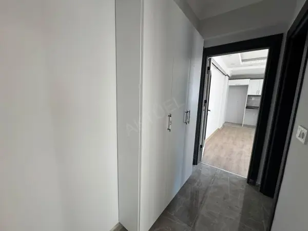 HÜRRİYET MAHALLESİNDE SATILIK SIFIR İSKANLI 1+1 DAİRE fotoğraf 15
