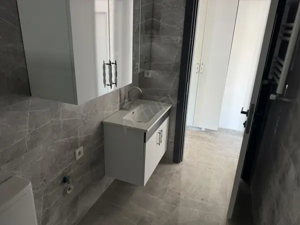 HÜRRİYET MAHALLESİNDE SATILIK SIFIR İSKANLI 1+1 DAİRE fotoğraf 14