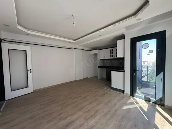 HÜRRİYET MAHALLESİNDE SATILIK SIFIR İSKANLI 1+1 DAİRE fotoğraf 3