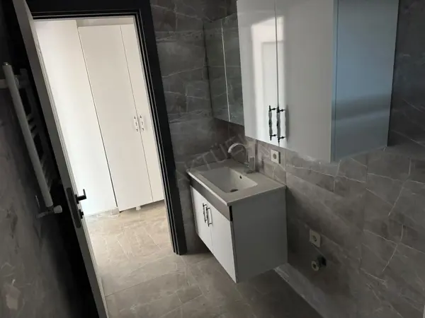 HÜRRİYET MAHALLESİNDE SATILIK SIFIR İSKANLI 1+1 DAİRE fotoğraf 14