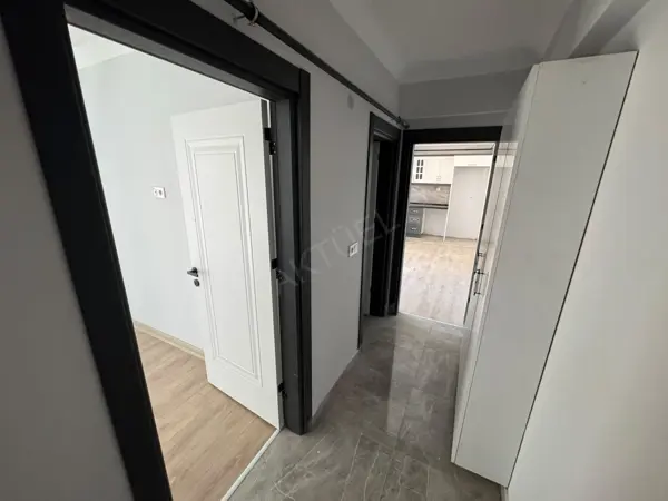 HÜRRİYET MAHALLESİNDE SATILIK SIFIR İSKANLI 1+1 DAİRE fotoğraf 13
