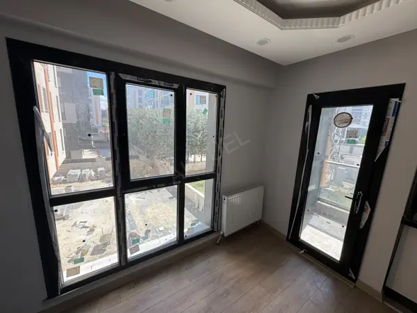 HÜRRİYET MAHALLESİNDE SATILIK SIFIR İSKANLI 1+1 DAİRE fotoğraf 7