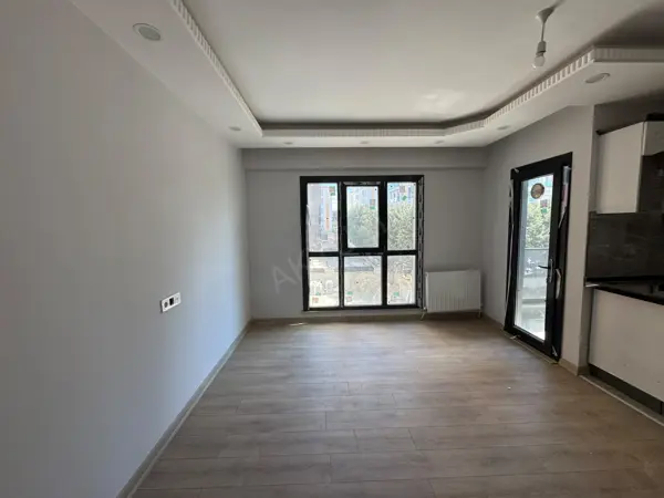 HÜRRİYET MAHALLESİNDE SATILIK SIFIR İSKANLI 1+1 DAİRE fotoğraf 4