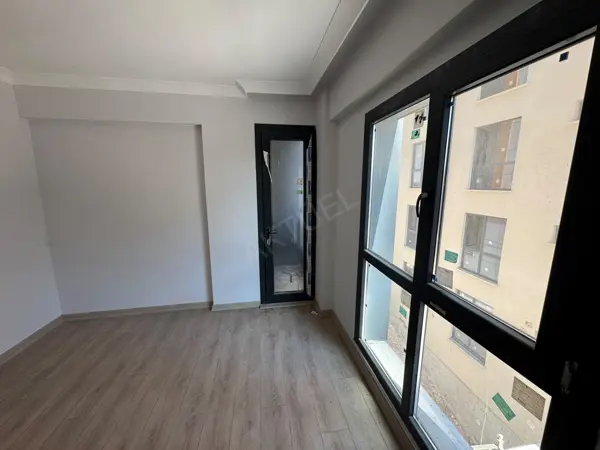 HÜRRİYET MAHALLESİNDE SATILIK SIFIR İSKANLI 1+1 DAİRE fotoğraf 9
